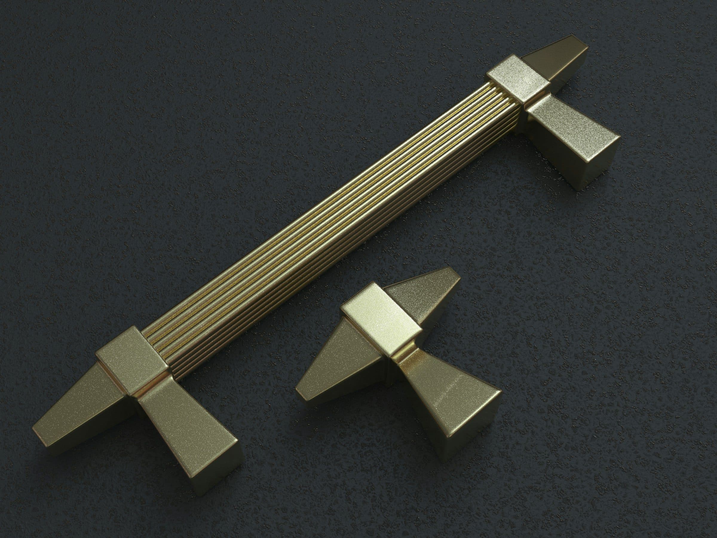 Brass cabinet pulls on a smooth painted cabinet door